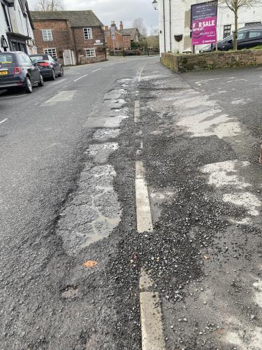 NOW FIXED:  Poor Road Surface , Town Road . Parish Council has reported this to L.C.C. who,  we understand,  are addressing it . 